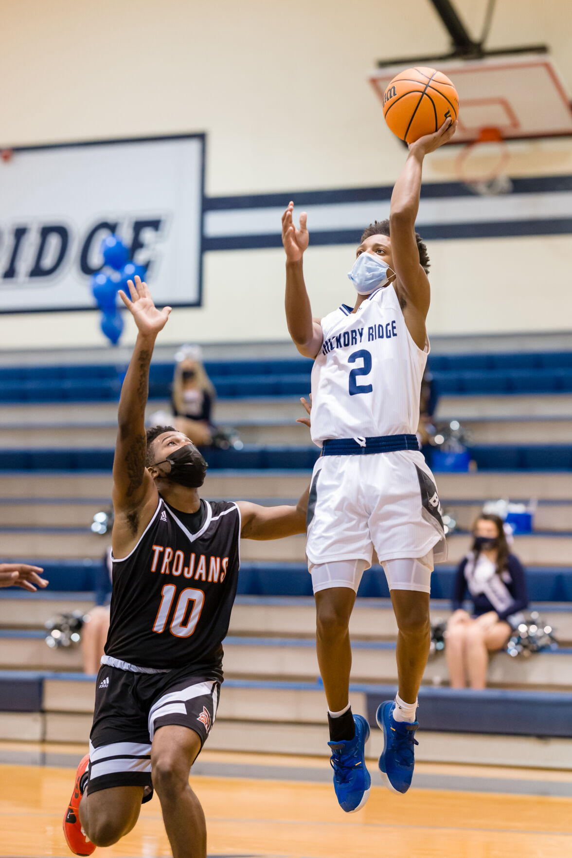 Boys Basketball: Hickory Ridge RaginÕ Bulls defeated the Northwest Cabarrus Trojans 64-56.
